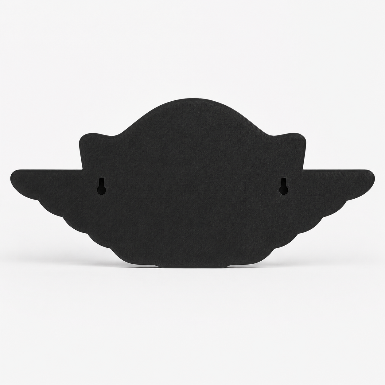 Black silhouette of a cat on a white background