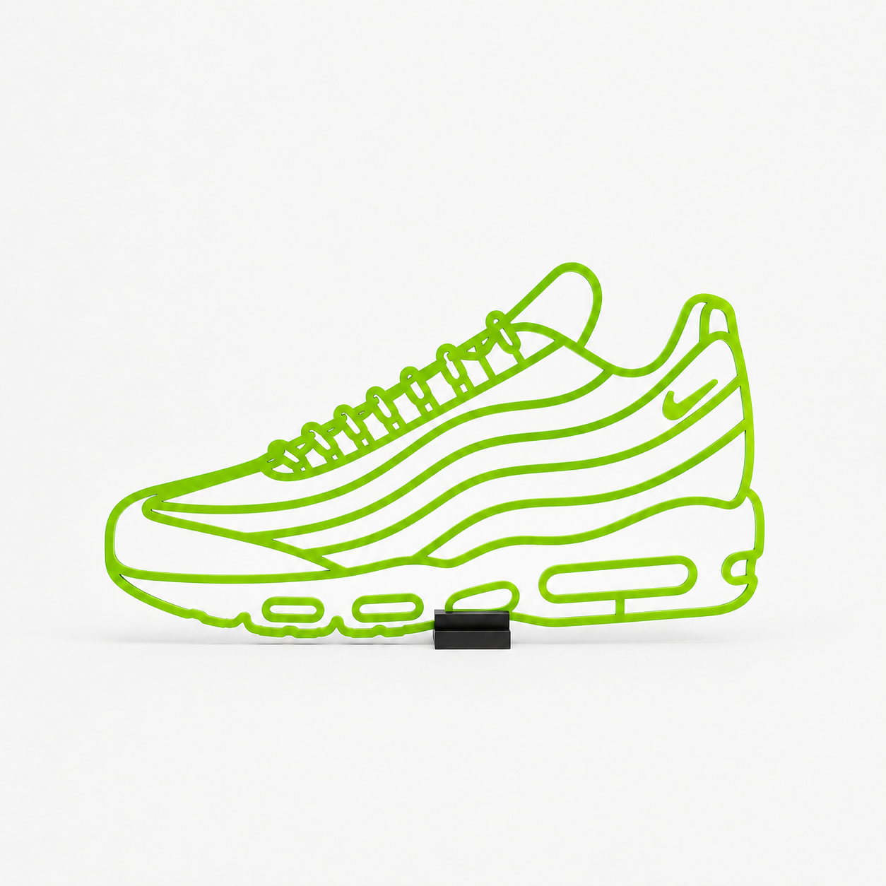 Outline of a sneaker in bright green on a white background